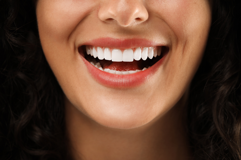 A patient and family celebrating her new smile